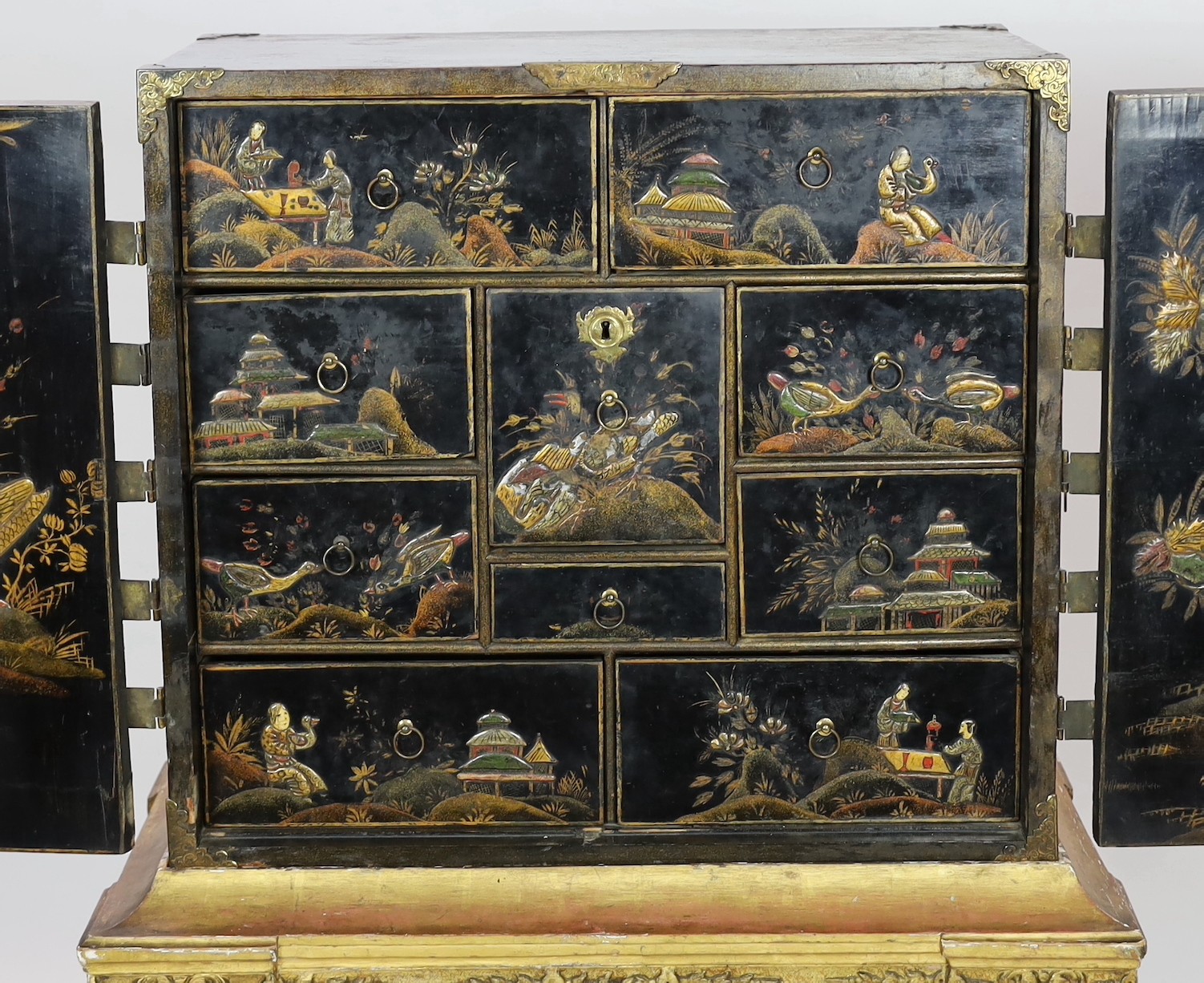 A William & Mary black japanned cabinet on stand, W.96cm D.61cm H. overall 149cm